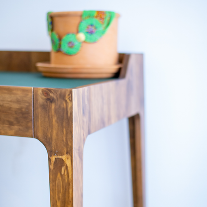 Manda Desk by The Seating Company — solid wood desk with integrated magazine rack, walnut finish, and minimal Scandinavian design