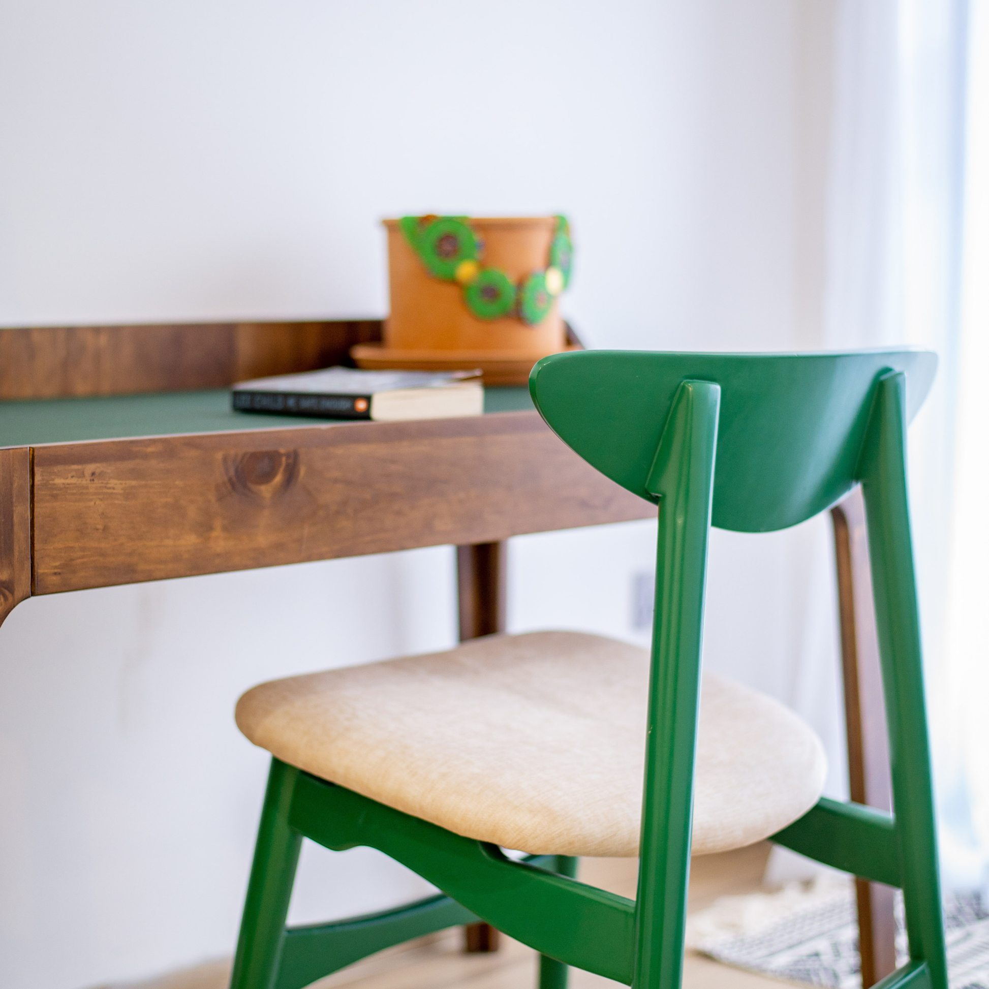 Manda Desk by The Seating Company — solid wood desk with integrated magazine rack, walnut finish, and minimal Scandinavian design