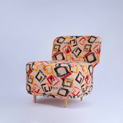 Patterned armchair on a light gray background