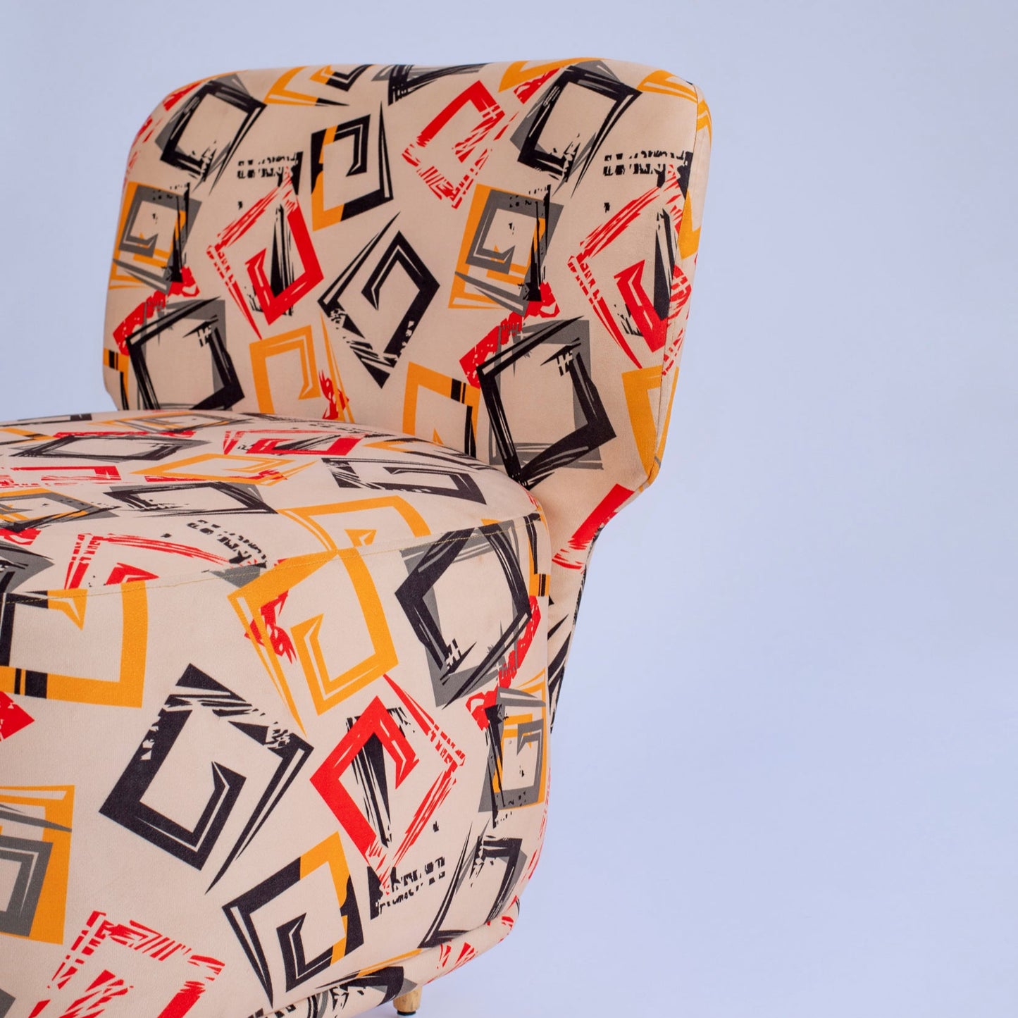 Chair with geometric pattern on a light gray background