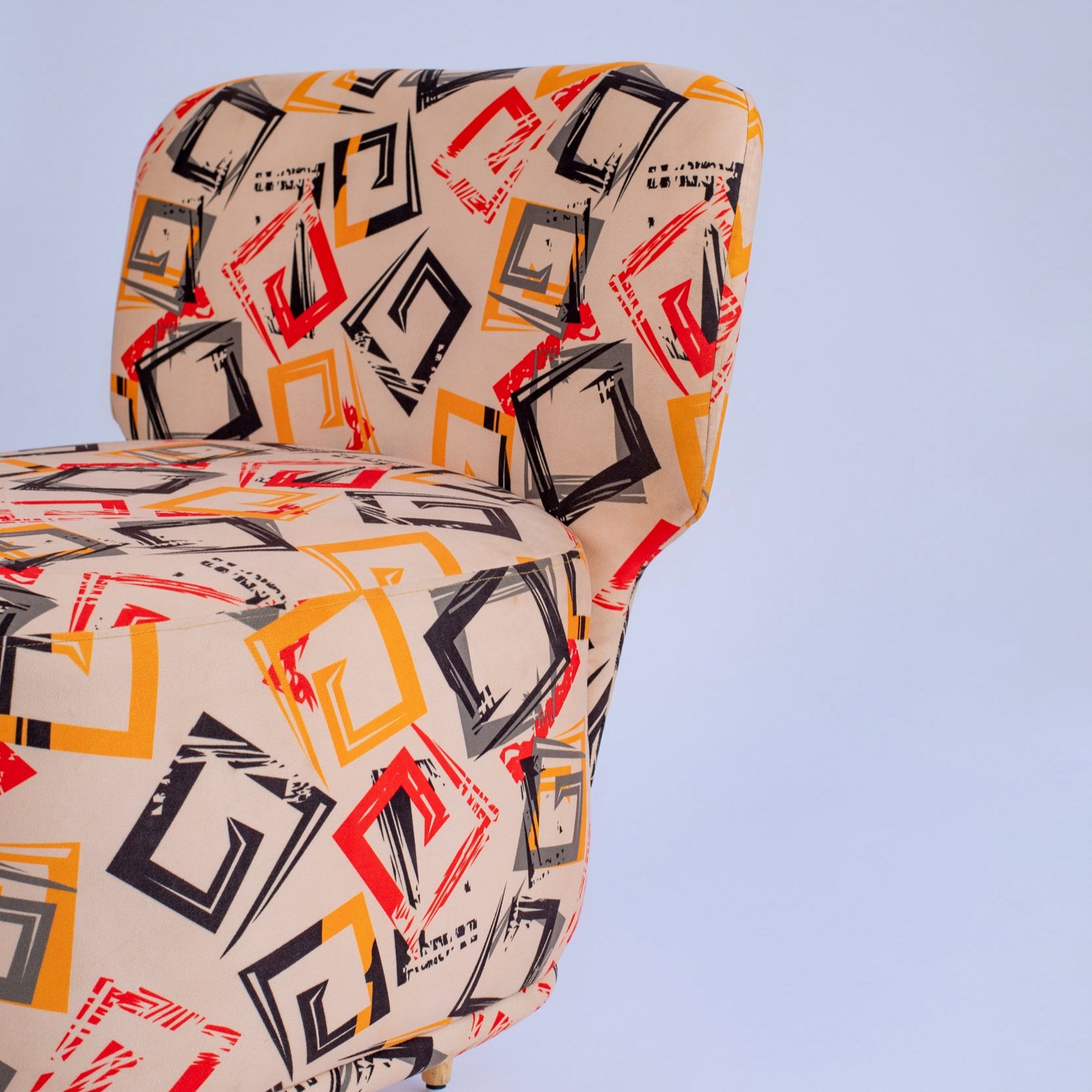 Chair with geometric pattern on a light gray background